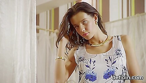 Sexy girl shows her feet in the park